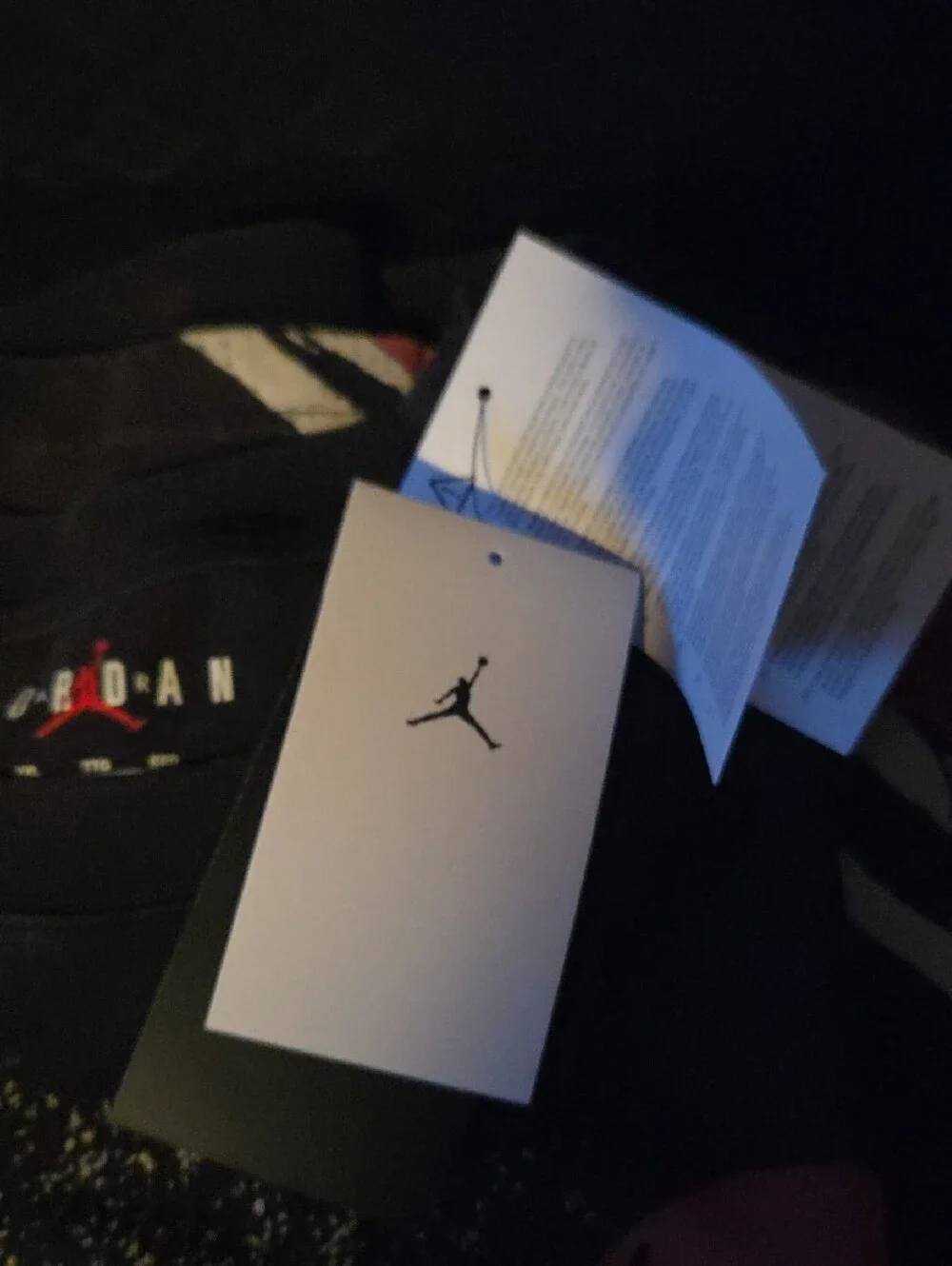 Jordan Black Tee with Red and White Basketball Graphic